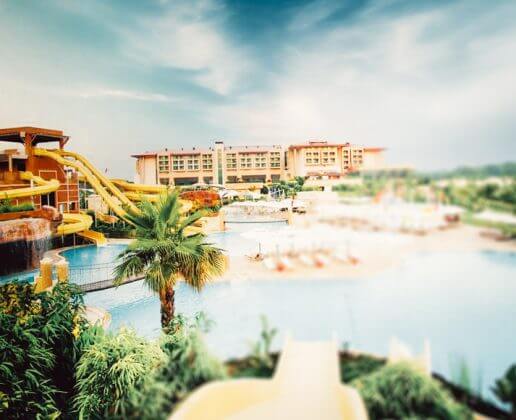 an outdoor swimming pool in Regnum Carya Golf Resort & Spa 5